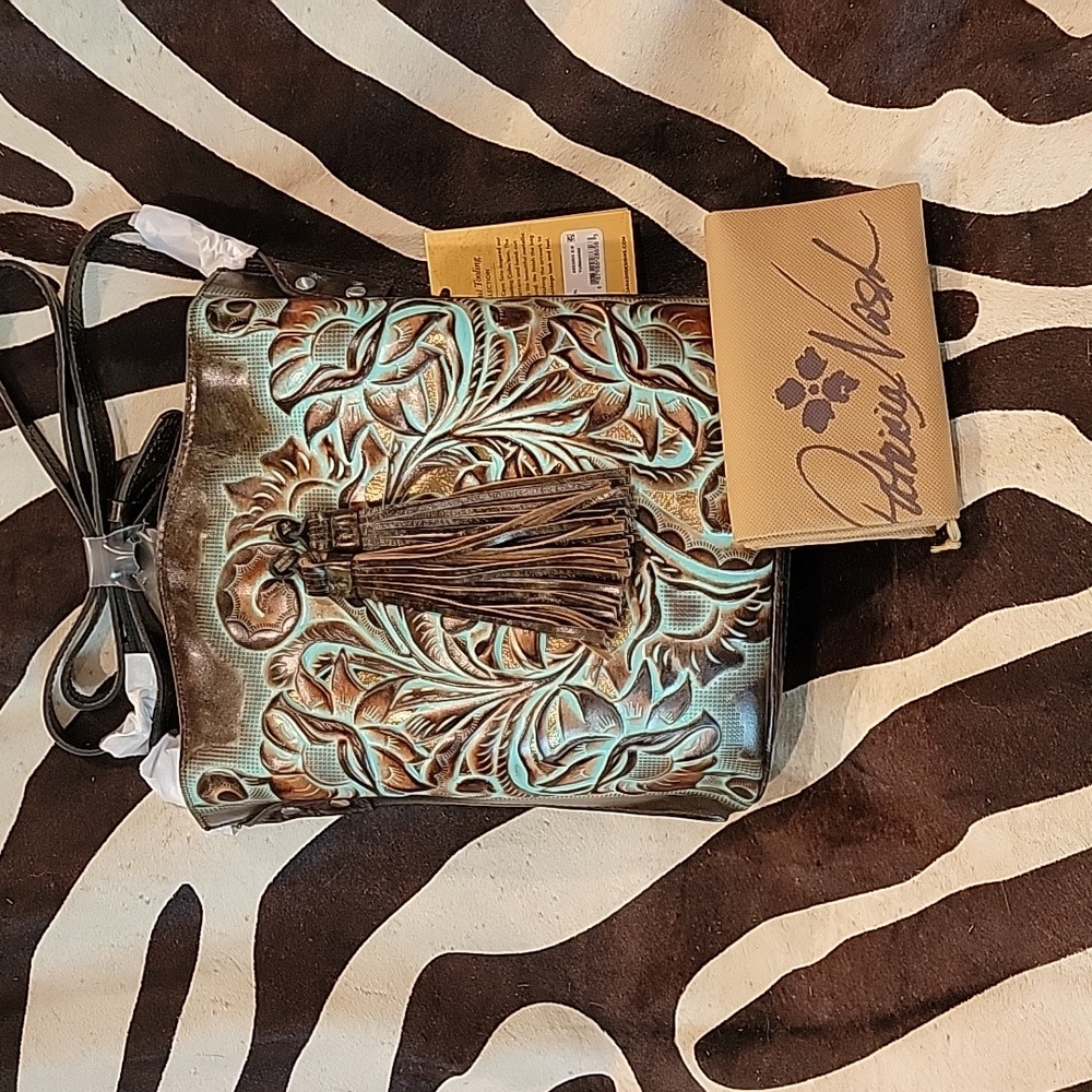 NWT- 🌹Patricia Nash Turquoise and Brown Tooled Leather with Tassel Accent